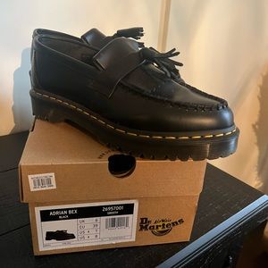 Doc Marten loafers with tassel.